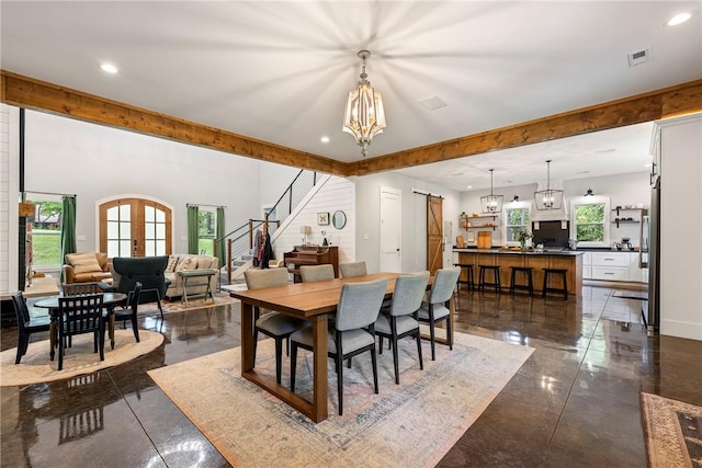 112 E Woodside Ln, Rogers, AR 72756 - dining area with a chandelier, plenty of natural light, recessed lighting, stairway, and baseboards