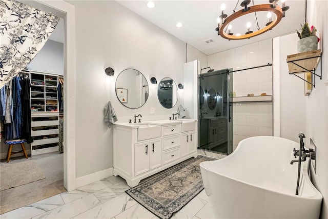 112 E Woodside Ln, Rogers, AR 72756 - full bath with a stall shower, a walk in closet, double vanity, recessed lighting, and marble finish flooring