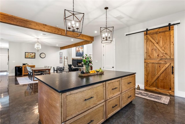 112 E Woodside Ln, Rogers, AR 72756 - kitchen featuring dark countertops, a barn door, concrete flooring, a chandelier, and recessed lighting