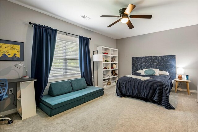 112 E Woodside Ln, Rogers, AR 72756 - carpeted bedroom featuring a ceiling fan and baseboards