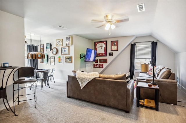201 Ryder St, Gentry, AR 72734 - living room featuring carpet floors, plenty of natural light, ceiling fan, vaulted ceiling, and baseboards