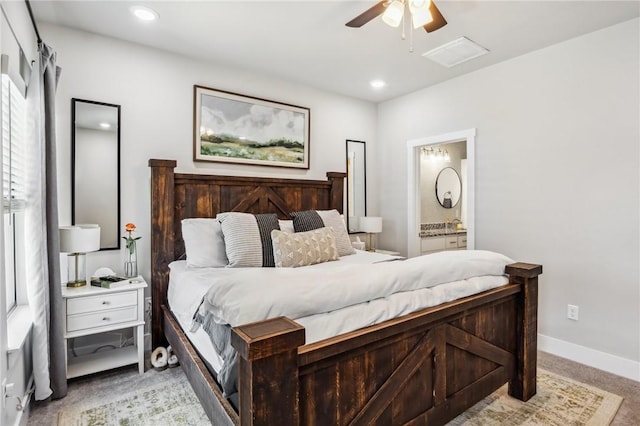 201 Ryder St, Gentry, AR 72734 - bedroom featuring baseboards, connected bathroom, recessed lighting, and ceiling fan
