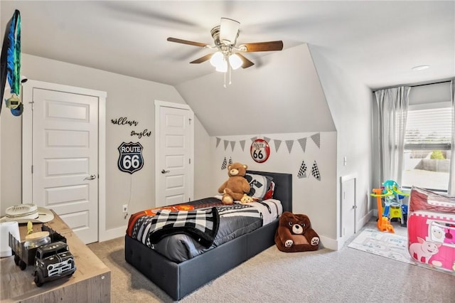201 Ryder St, Gentry, AR 72734 - carpeted bedroom with vaulted ceiling, baseboards, and ceiling fan