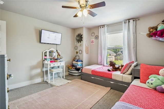201 Ryder St, Gentry, AR 72734 - bedroom featuring carpet, ceiling fan, and baseboards