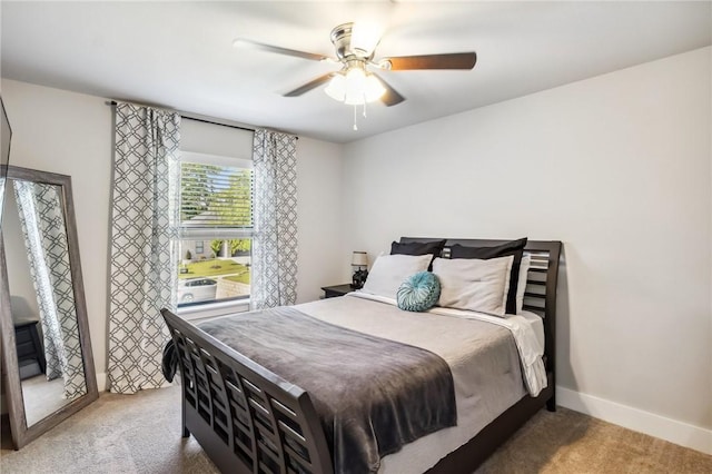 201 Ryder St, Gentry, AR 72734 - carpeted bedroom featuring baseboards and a ceiling fan