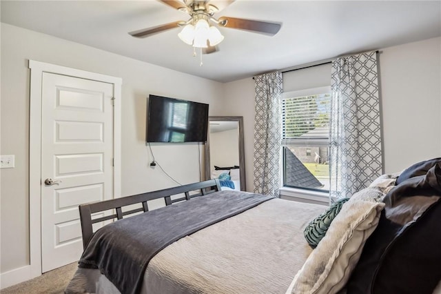 201 Ryder St, Gentry, AR 72734 - bedroom featuring carpet flooring, ceiling fan, and baseboards