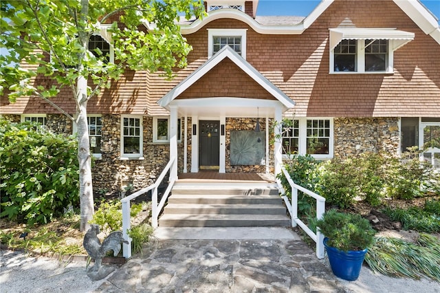 615 E Prairie Creek Dr, Rogers, AR 72756 - shingle-style home featuring stone siding