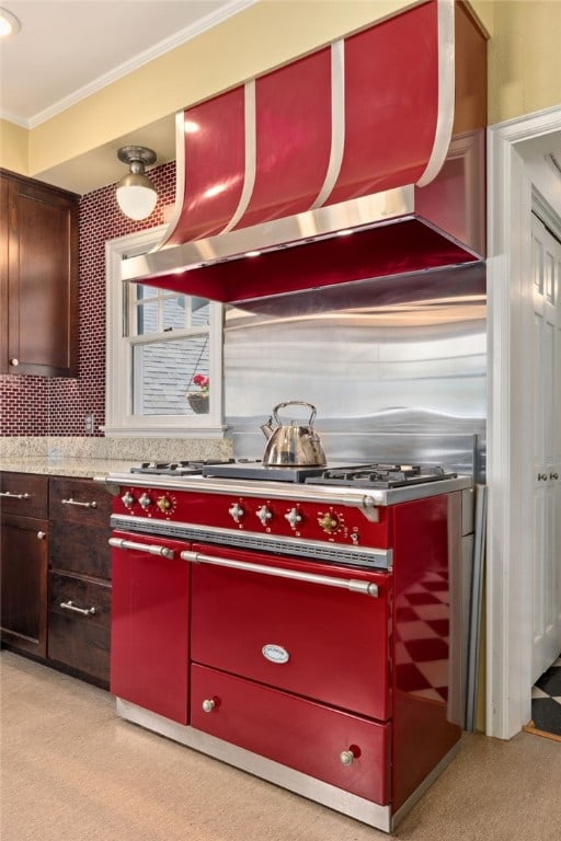 615 E Prairie Creek Dr, Rogers, AR 72756 - kitchen featuring range hood, crown molding, and light countertops