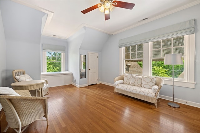 615 E Prairie Creek Dr, Rogers, AR 72756 - living area featuring ornamental molding, ceiling fan, baseboards, and wood finished floors