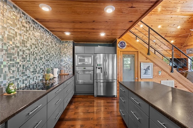 482 County Road 332, Eureka Springs, AR 72632 - kitchen featuring stainless steel appliances, wood ceiling, gray cabinets, dark countertops, and recessed lighting