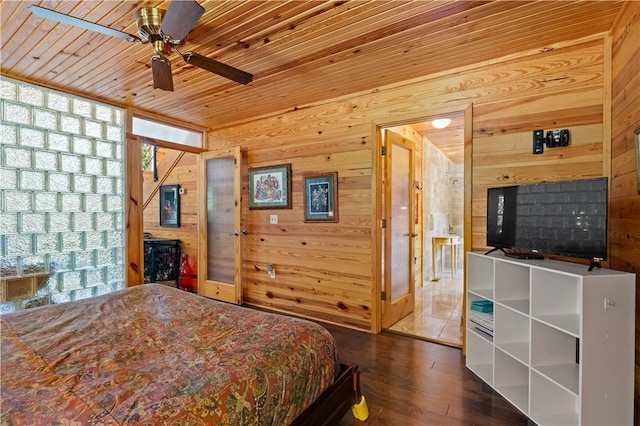 482 County Road 332, Eureka Springs, AR 72632 - bedroom featuring wood walls, wooden ceiling, and dark wood-style floors