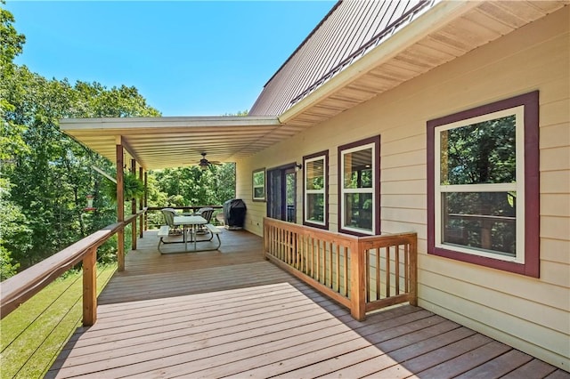 482 County Road 332, Eureka Springs, AR 72632 - wooden terrace with a ceiling fan and outdoor dining space
