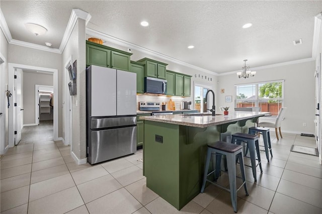 1320 Lariat Dr, Centerton, AR 72719 - kitchen with green cabinets, stainless steel appliances, a chandelier, a textured ceiling, and a sink