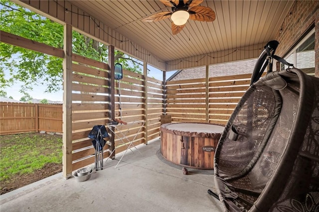 1320 Lariat Dr, Centerton, AR 72719 - fenced backyard featuring ceiling fan and a patio area