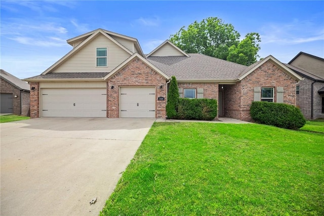1320 Lariat Dr, Centerton, AR 72719 - traditional-style home featuring brick siding, a front lawn, concrete driveway, a shingled roof, and an attached garage