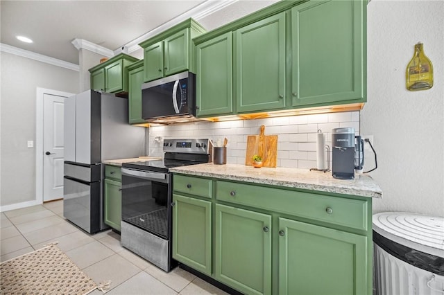 1320 Lariat Dr, Centerton, AR 72719 - kitchen with stainless steel appliances, crown molding, backsplash, green cabinets, and light tile patterned flooring