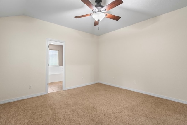 12305 Tyson Rd, Lowell, AR 72745 - unfurnished room with light colored carpet, ceiling fan, and vaulted ceiling