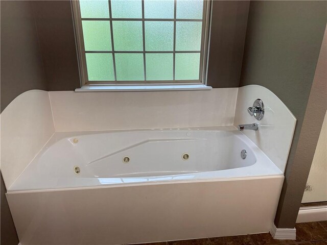 12305 Tyson Rd, Lowell, AR 72745 - bathroom with a jetted tub