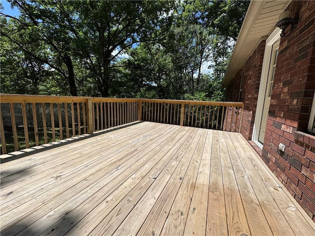 12305 Tyson Rd, Lowell, AR 72745 - wooden deck with view of scattered trees
