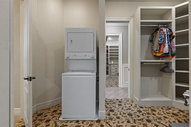4465 Champagne Dr, Springdale, AR 72764 - laundry room featuring stacked washer / dryer
