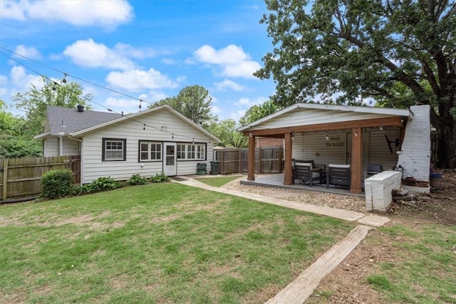 626 Ash St, Fayetteville, AR 72703 - rear view of house with a patio area and outdoor lounge area