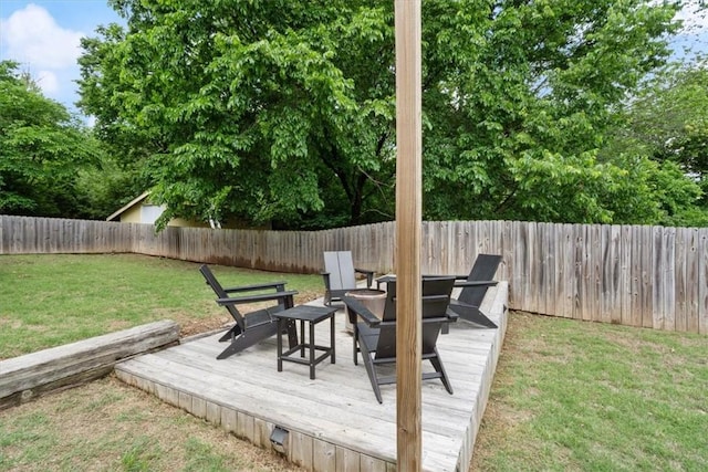 626 Ash St, Fayetteville, AR 72703 - wooden terrace featuring an outdoor fire pit
