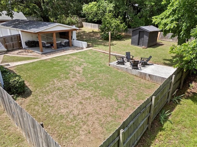 626 Ash St, Fayetteville, AR 72703 - view of yard featuring a fire pit and a patio