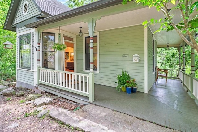 11 Hilton St, Eureka Springs, AR 72632 - doorway to property featuring covered porch