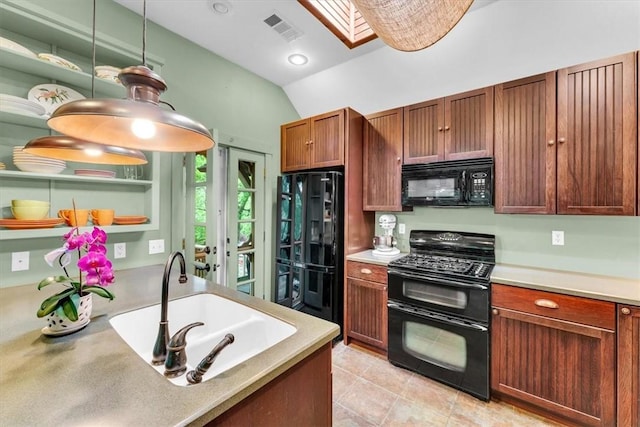 11 Hilton St, Eureka Springs, AR 72632 - kitchen featuring black appliances, vaulted ceiling, light countertops, light tile patterned floors, and a skylight