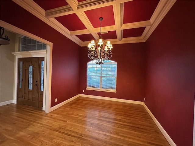 5749 S Chanberry Ln, Rogers, AR 72758 - spare room featuring a chandelier, wood finished floors, coffered ceiling, baseboards, and ornamental molding