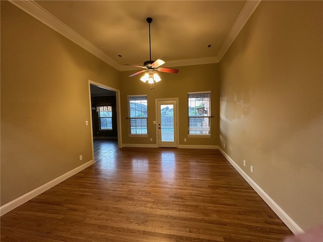 5749 S Chanberry Ln, Rogers, AR 72758 - spare room with a ceiling fan, dark wood-type flooring, crown molding, and baseboards