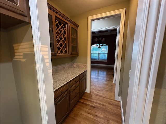 5749 S Chanberry Ln, Rogers, AR 72758 - bar area featuring light wood-style flooring
