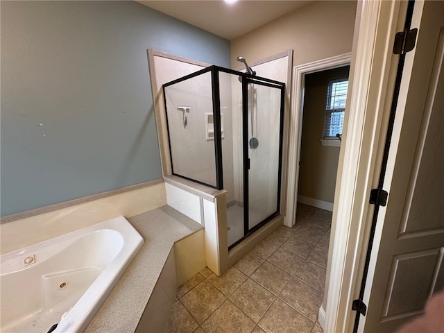5749 S Chanberry Ln, Rogers, AR 72758 - bathroom with a stall shower, a tub with jets, and tile patterned floors