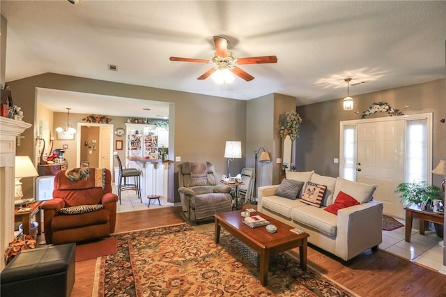 925 Lowell Ave, Cave Springs, AR 72718 - living area featuring wood finished floors and a ceiling fan