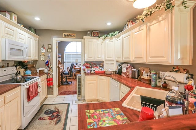 925 Lowell Ave, Cave Springs, AR 72718 - kitchen with white appliances, a sink, wooden counters, light tile patterned floors, and recessed lighting