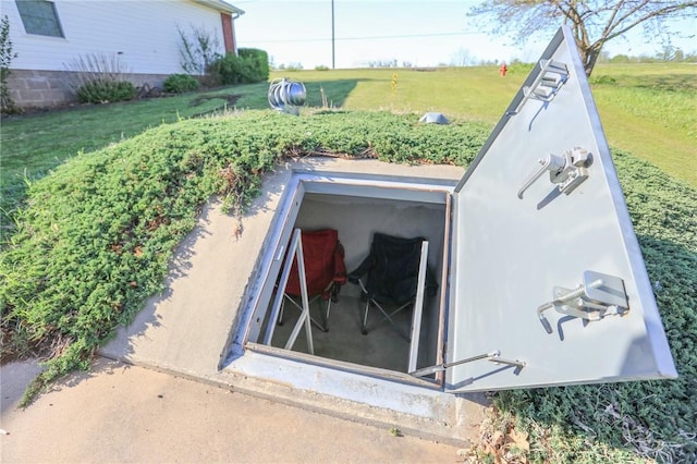 925 Lowell Ave, Cave Springs, AR 72718 - entry to storm shelter featuring a lawn