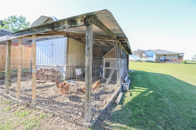 925 Lowell Ave, Cave Springs, AR 72718 - view of poultry coop featuring a lawn