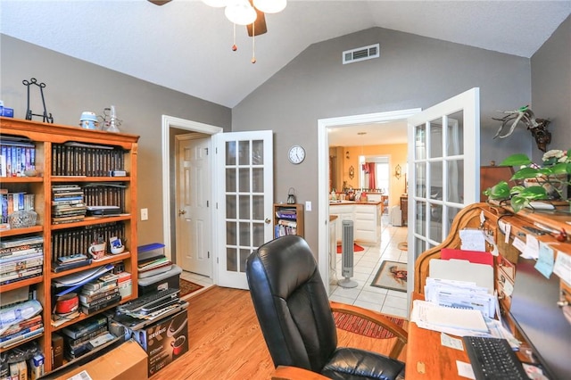 925 Lowell Ave, Cave Springs, AR 72718 - office featuring french doors, lofted ceiling, ceiling fan, and wood finished floors