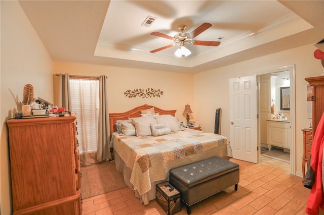925 Lowell Ave, Cave Springs, AR 72718 - bedroom with a raised ceiling, crown molding, ensuite bathroom, a ceiling fan, and light wood finished floors