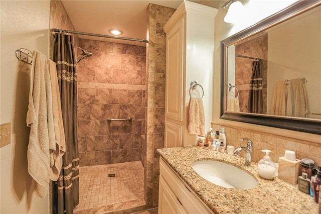 925 Lowell Ave, Cave Springs, AR 72718 - full bath with a tile shower, vanity, and decorative backsplash