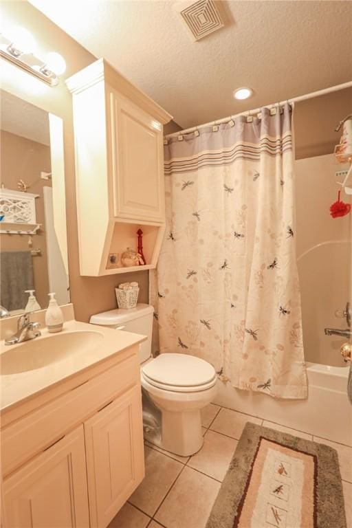 925 Lowell Ave, Cave Springs, AR 72718 - bathroom with tile patterned flooring, toilet, vanity, shower / bath combo, and a textured ceiling