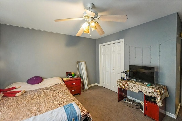 814 Colley St, Lowell, AR 72745 - bedroom featuring carpet floors, ceiling fan, a closet, and baseboards