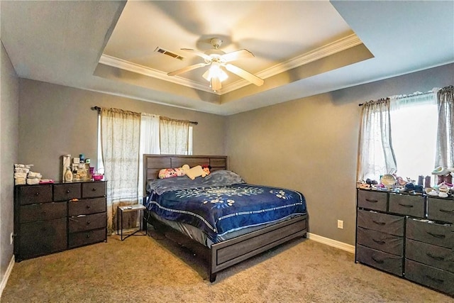 814 Colley St, Lowell, AR 72745 - carpeted bedroom featuring a tray ceiling, ornamental molding, baseboards, and a ceiling fan