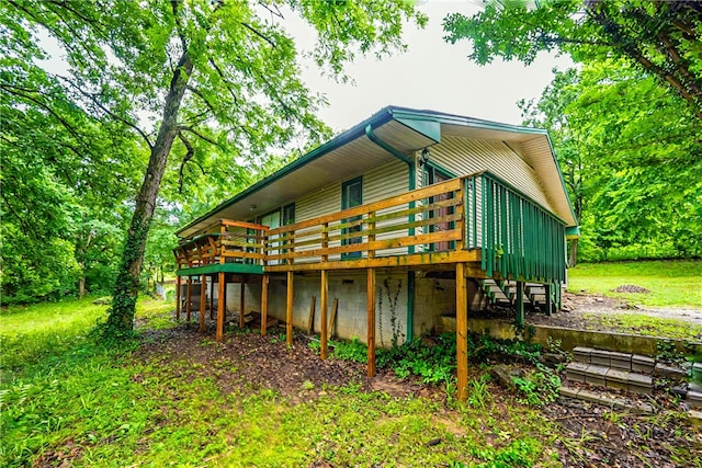 10703 Thunder Rd, Fayetteville, AR 72701 - back of property with a deck