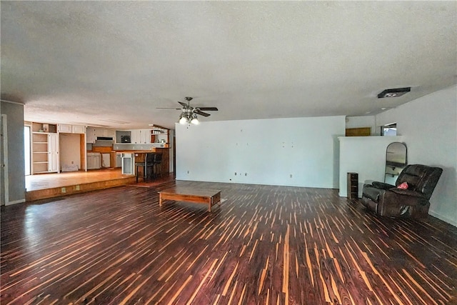 10703 Thunder Rd, Fayetteville, AR 72701 - unfurnished living room with hardwood / wood-style floors, a ceiling fan, and a textured ceiling
