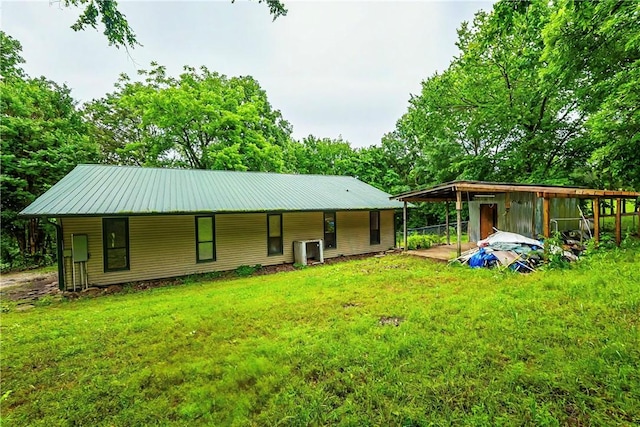 10703 Thunder Rd, Fayetteville, AR 72701 - view of front of house with a front lawn and a metal roof