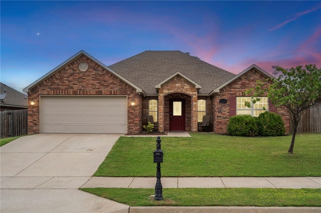 1503 W Kelley Dr, Rogers, AR 72756 - view of front of home featuring a shingled roof, an attached garage, driveway, and brick siding