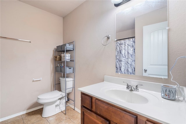 1503 W Kelley Dr, Rogers, AR 72756 - bathroom featuring vanity, tile patterned floors, toilet, and baseboards