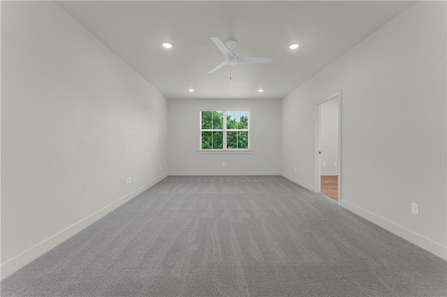 1559 W Cassi Aly, Fayetteville, AR 72701 - spare room with a ceiling fan, light colored carpet, recessed lighting, and baseboards