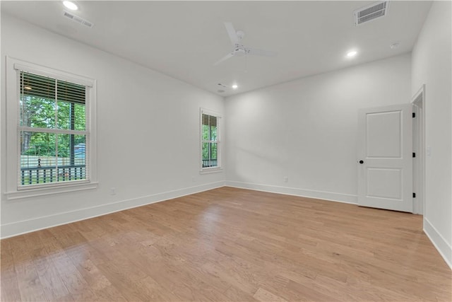1559 W Cassi Aly, Fayetteville, AR 72701 - unfurnished room featuring light wood-style floors, ceiling fan, baseboards, and recessed lighting